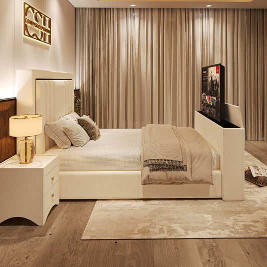 A sleek white 2025 Kensington TV Bed with an upholstered headboard and integrated television, in a modern bedroom.