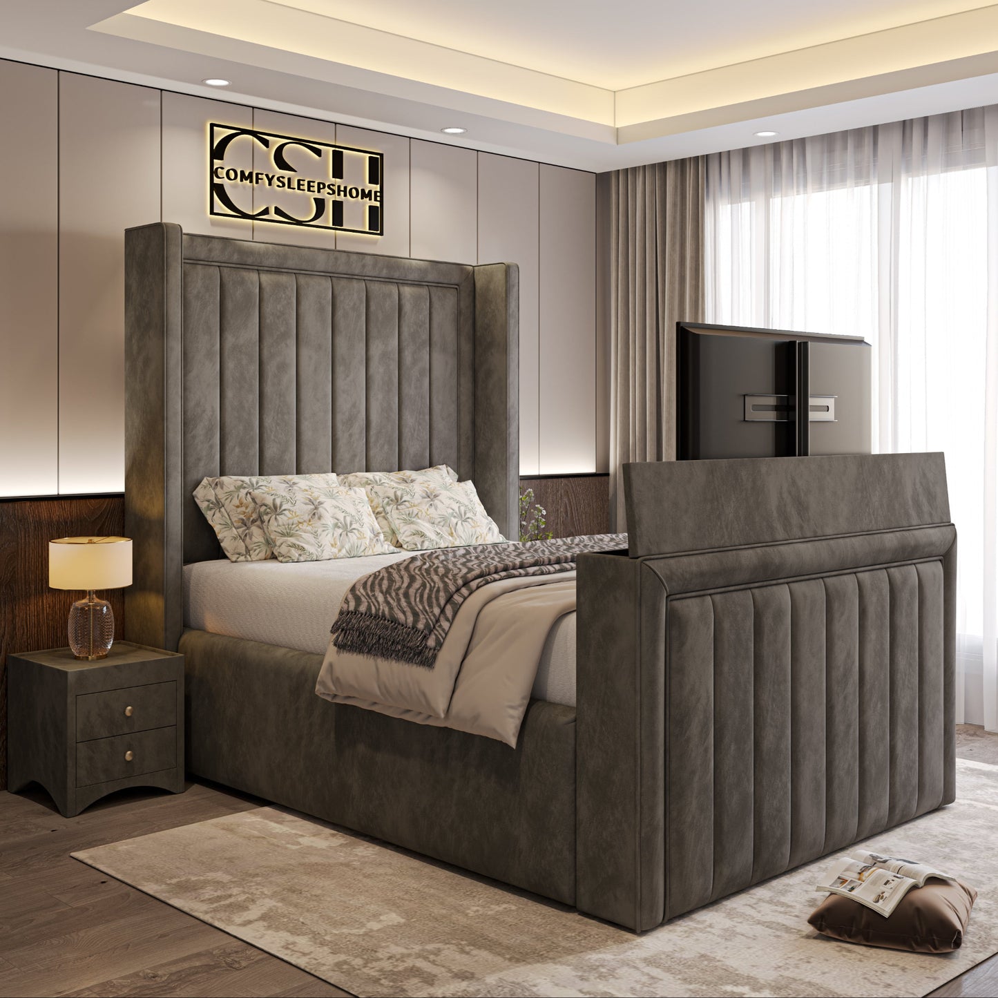 A modern bedroom featuring a grey upholstered bed with a built-in TV at the foot, 2025 The Astoria TV Bed.