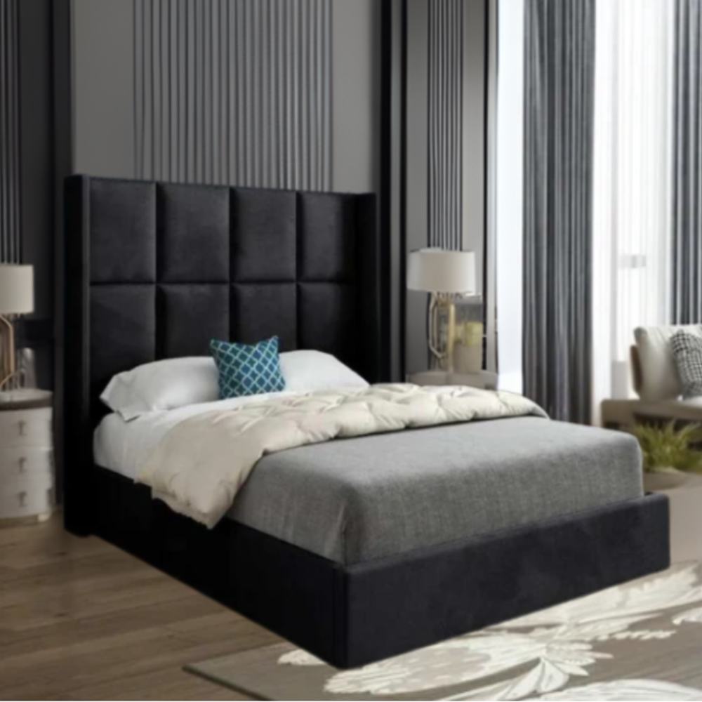 Modern bedroom with a dark upholstered bed, tall headboard, and teal throw pillow.