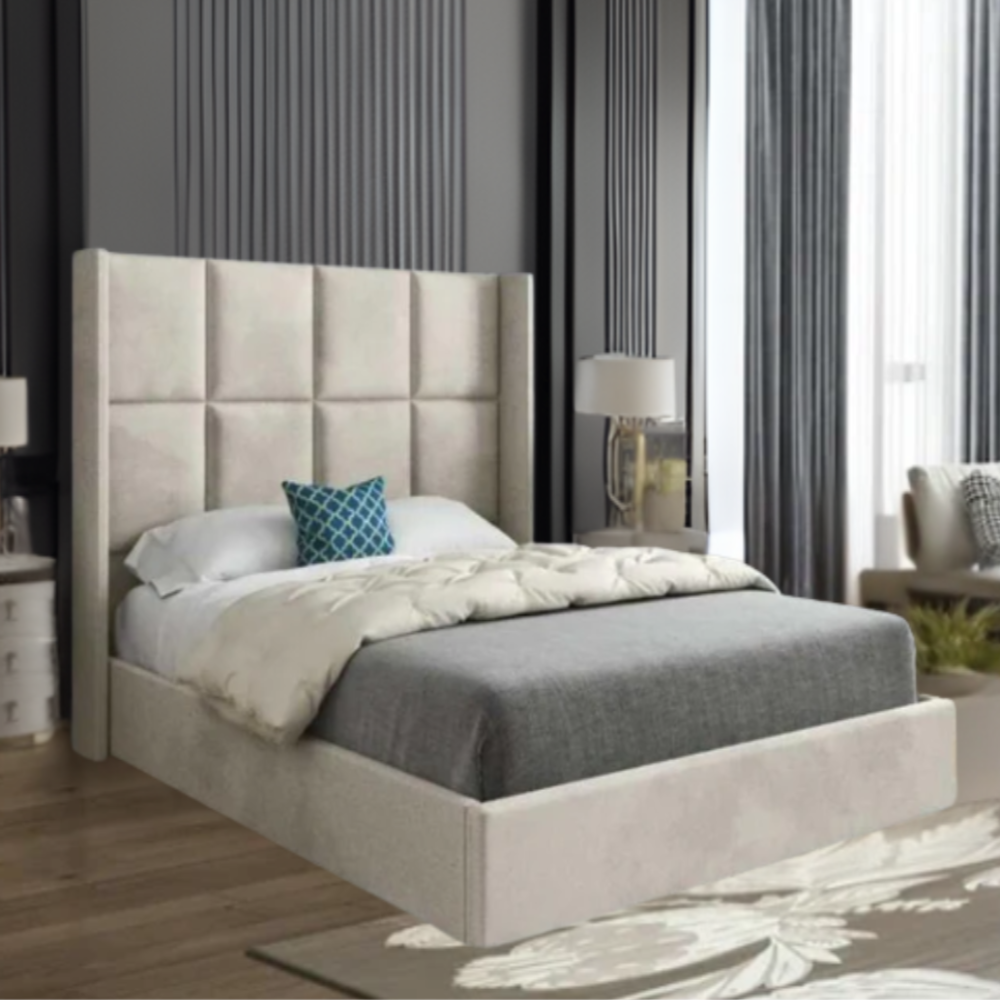 A modern bedroom with a tall, upholstered headboard and a teal decorative pillow on the bed.