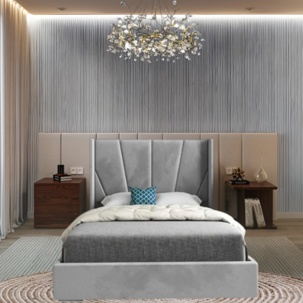 Modern bedroom with a grey upholstered bed, patterned headboard, and an elaborate chandelier.