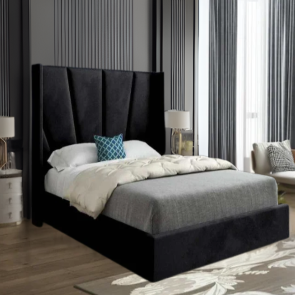 Modern bedroom with a black upholstered bed and teal decorative pillow.