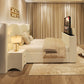 Elegant bedroom featuring the 2025 Alyssia TV Bed with built-in TV, cream upholstery, soft bedding, and warm ambient lighting.