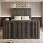 Modern bedroom with the 2025 Belgravia TV Bed, showcasing a built-in TV, plush bedding, sleek grey design, and warm lighting.