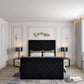Modern bedroom with 2025 Florence TV bed featuring a black tufted headboard and footboard, flanked by bedside tables.