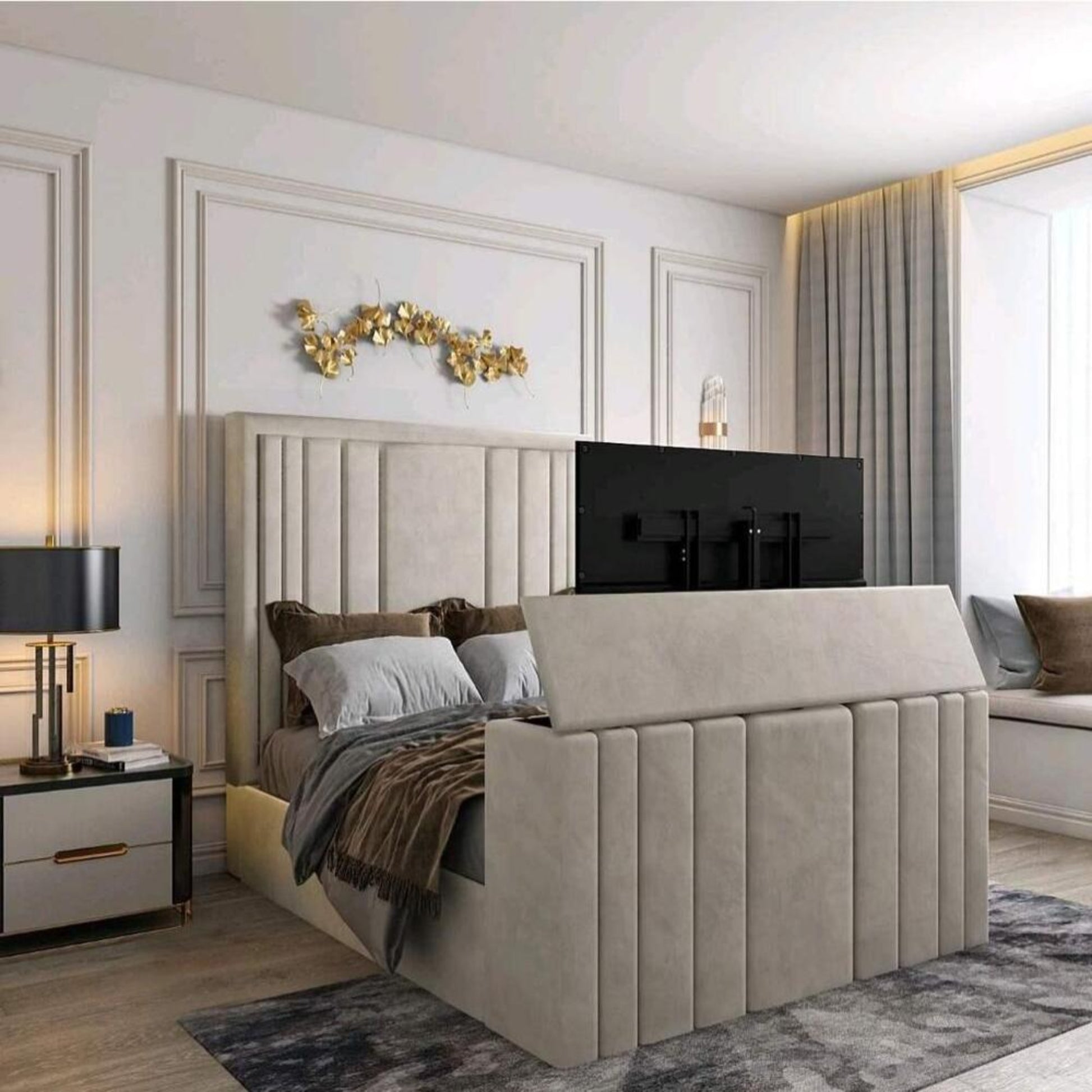 Modern bedroom with 2025 lily TV bed, upholstered in gray with built-in TV, against paneled walls and decorative gold leaves.