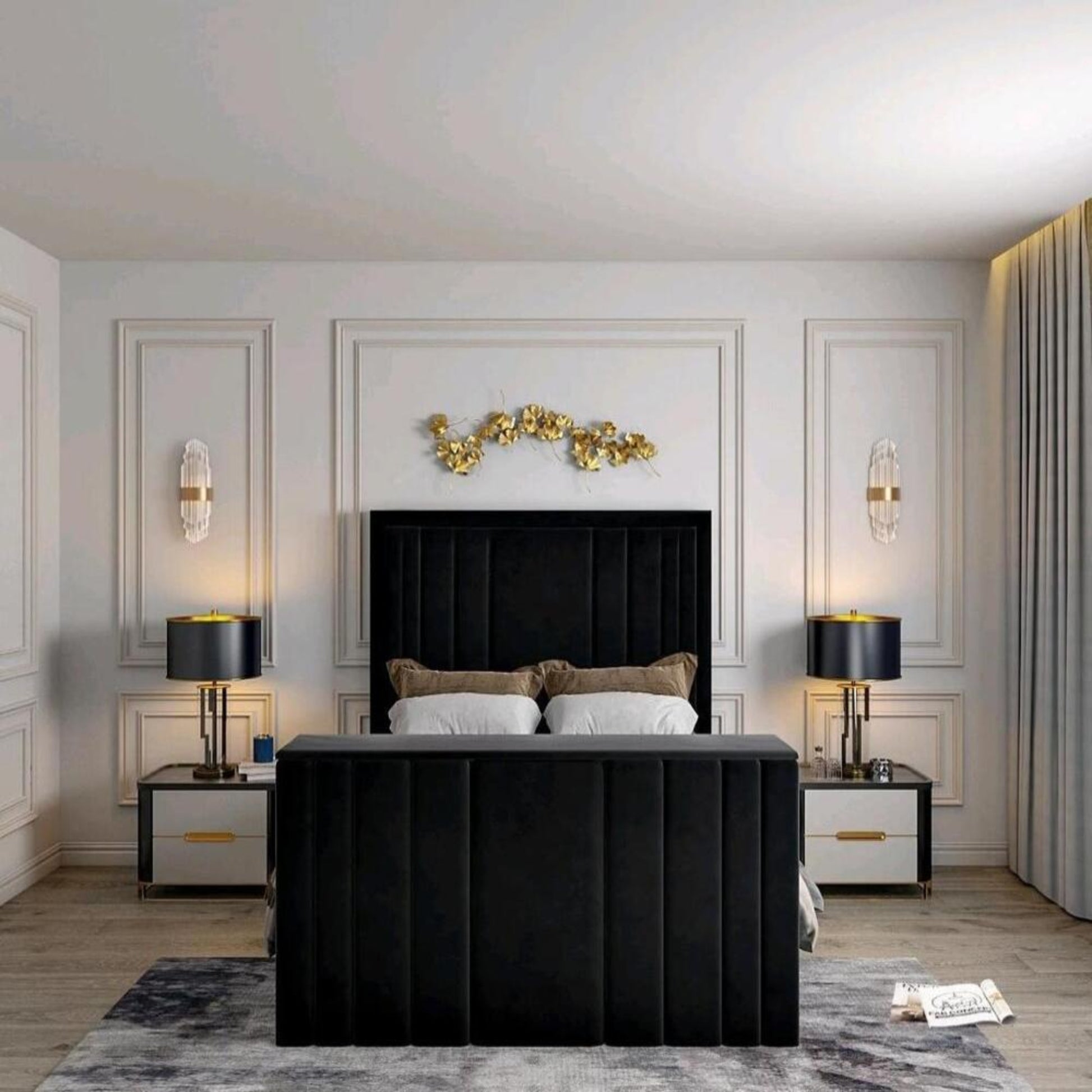 Modern bedroom with a black 2025 lily TV bed, white sheets, brown pillows, elegant lamps, and golden decor on the wall.