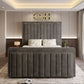 Modern bedroom featuring a central upholstered bed, 2025 The Zenith TV bed, pendant chandelier, and decorative elements.