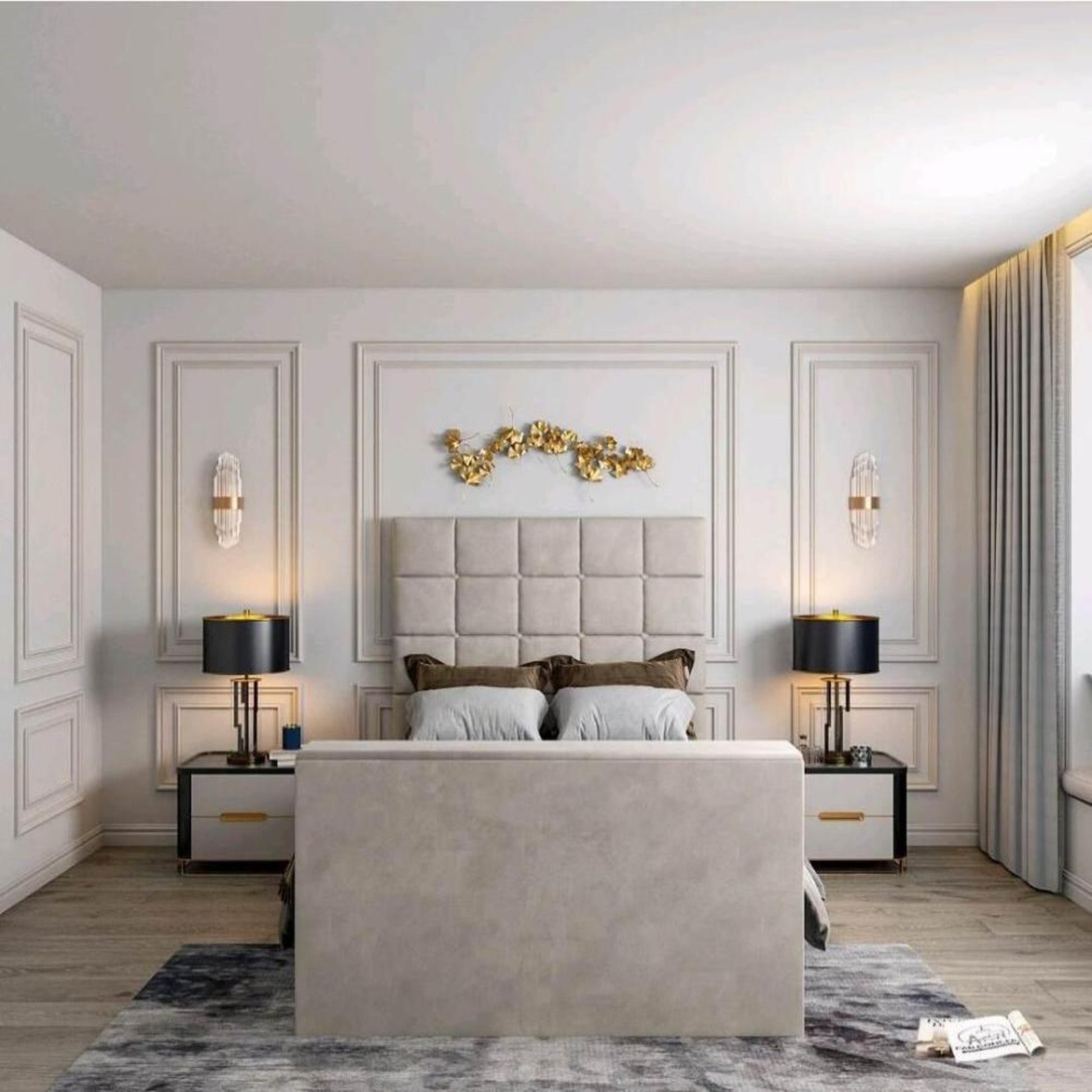 Modern bedroom with a 2025 Windsor TV bed, padded headboard, gold leaf wall art, lamps, and nightstands on a gray rug.
