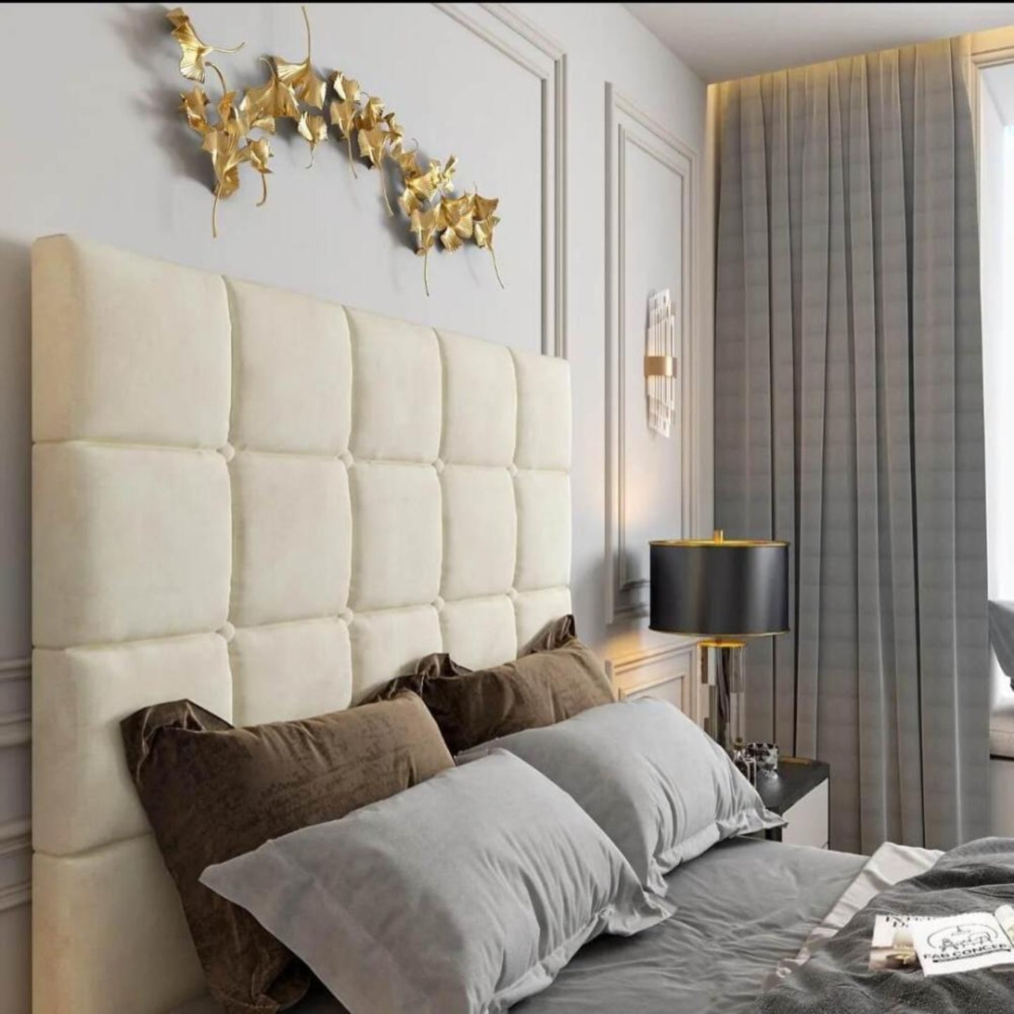 Modern bedroom with a 2025 Windsor TV bed, tufted headboard, and gold wall decor.
